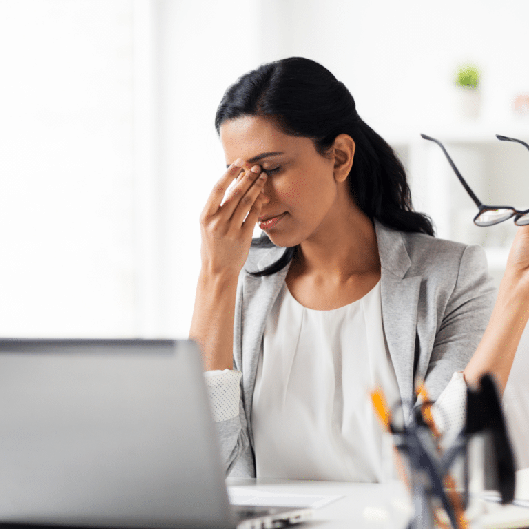 tired-woman-laptop-ap-automation-software-768x768